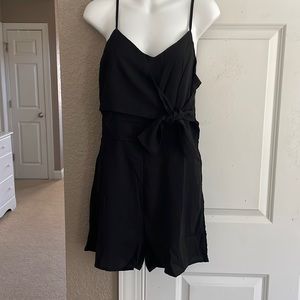 Black romper tie side elastic back with zip never worn